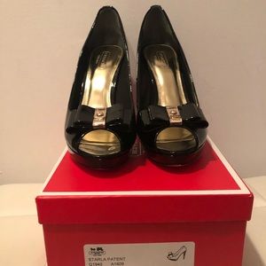 Coach patent leather heels. Never worn. Size 8